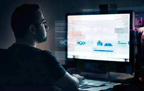 Developing in progress. Cropped shot of a young computer programmer looking Foto stock