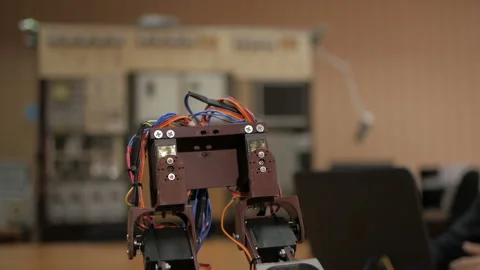 Developing a robot for young scientists. The legs of the robot. Robo technology. Stock-Footage 98743839