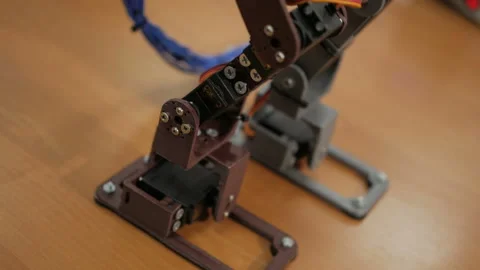 Developing a robot for young scientists. The legs of the robot. Robo technology. Stock-Footage 98746301