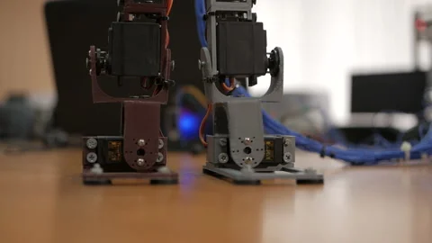 Developing a robot for young scientists. The legs of the robot. Robo technology. Stock Footage 98750429
