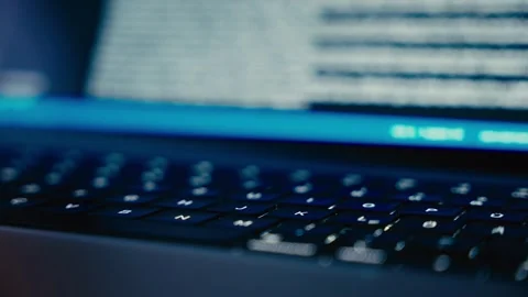 Developing Software Code on a Modern Laptop Computer in Dark Workspace 库存影片 331165051