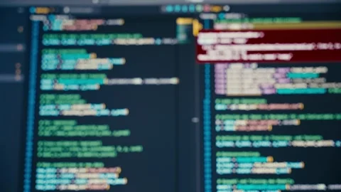 Developing Software Code Shown on a Computer Monitor Displaying Scripts 库存影片 331164954