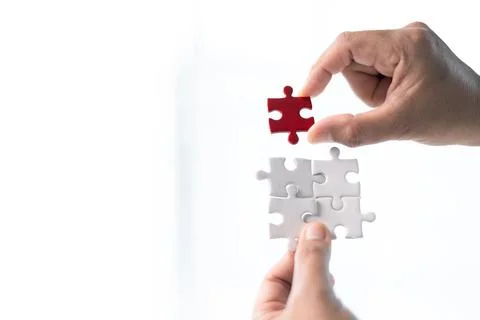 Developing strategic approach to each challenge in business is like piecing.. Stock Photos