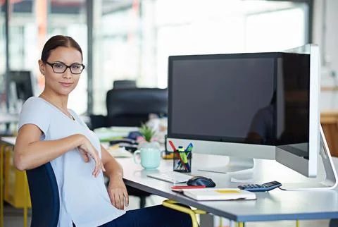 Developing tomorrows tech today. a designer at their workstation in an office. Stock Photos