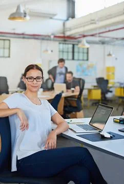 Developing tomorrows tech today. a designer at their workstation in an office. Stock Photos