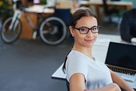 Developing tomorrows tech today. a designer at their workstation in an office. Stock Photos