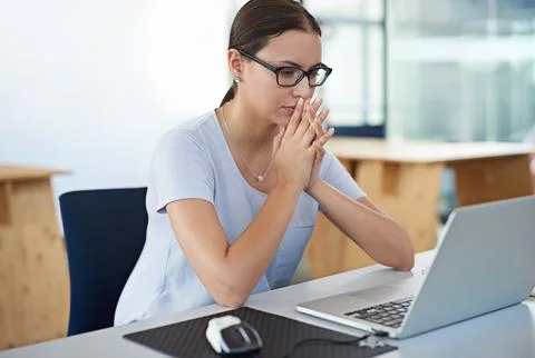 Developing tomorrows tech today. a designer at their workstation in an office. Stock Photos