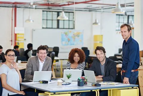 Developing tomorrows tech today. a designer at their workstation in an office. Stock Photos
