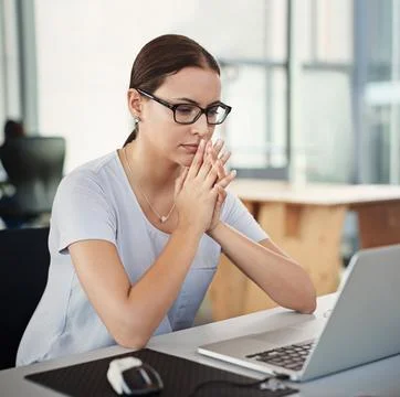 Developing tomorrows tech today. a designer sitting at her desk in an office. Stock Photos