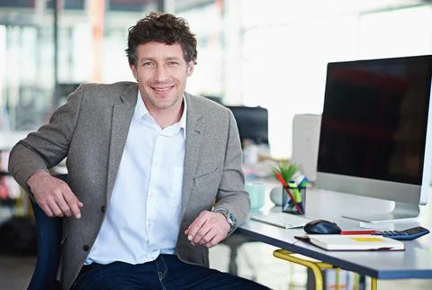 Developing tomorrows tech today. a designer at their workstation in an office. Stock Photos