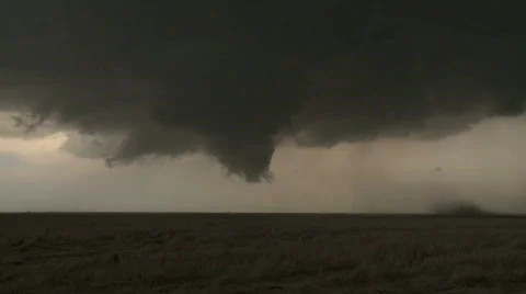 Developing tornado under a supercell wall cloud Stock Footage 457394