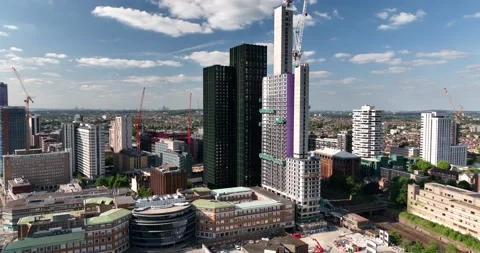 Developing urban borough, cranes on construction site of high rise buildings Vídeos de archivo 201924430