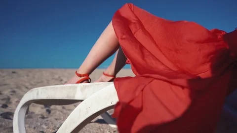 Developing the wind Red skirt Stock Footage