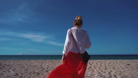 Developing the wind Red skirt Stock Footage