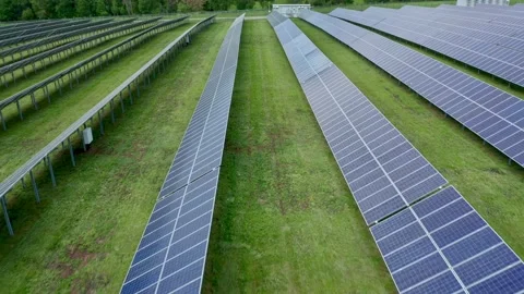 The development of the alternative energy industry. Agrivolt farm. Control the Stock Footage 156038563