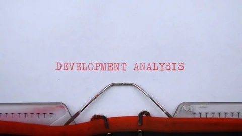 Development analysis - phrase printed on an old typewriter in red letters Видео 129535784