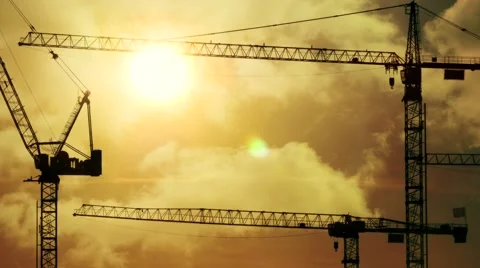 Development background. business growth. crane construction. sunset sky Stock Footage 64541258