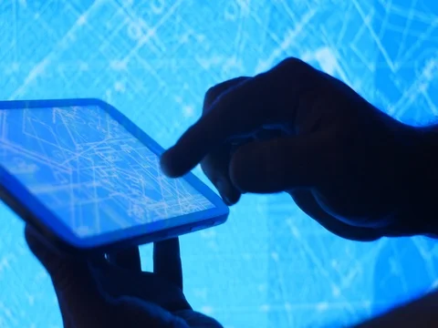 Development of infrastructure blueprint design on smart device Stock Footage 74077147