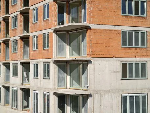 Development project featuring incomplete brick and concrete elements ready .. Stock Photos