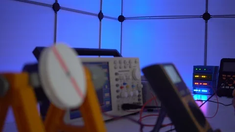 Development of a servo design in a robotics laboratory. Workbench with an osc Stock Footage 121503211