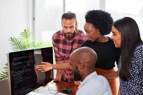 Development team reviews code, product owner, scrum master, developers in office 写真素材