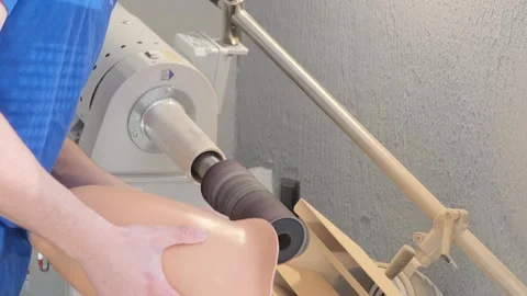 Development of a working, fixing mechanism for a new prosthesis in the workshop. Stockbeeldmateriaal 269369758