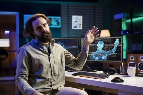 Deviant AI superintelligence enslaving its creator, controlling his limbs Stock Photos