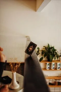 Deviant Moon Tarot Cards Spread in Hands Stock Photos