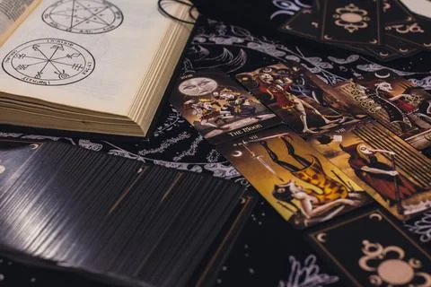 Deviant Moon Tarot Cards Spread in Hands Stock Photos