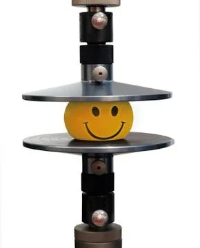 The device for check of compression of materials Stock Photos