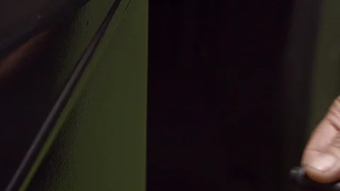 Device for checking the thickness of iron Stock Footage 128354717