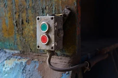 Device to control industrial machine with red and green button Stock Photos