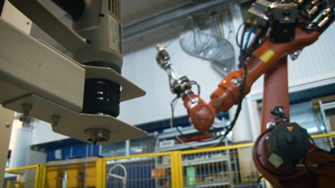 The device controlled by the console puts the product on a metal stand. Aircraft Stock Footage 108340847