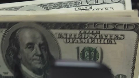 The device counts the bucks close-up Video stock 183957135