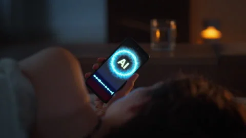 Device dependency in modern life. Late at night a young woman lies under a b Video stock 345577826