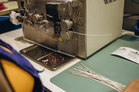 Device for feeding measuring cable, cutting, stripping, crimping machine for  Stock Photos