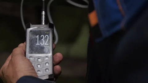 Device in hand with numbers Stock Footage 128354764