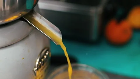 Device Is Making Fresh Orange Juice Video stock 130588989