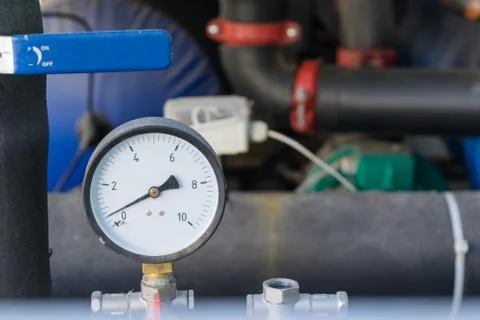 A device for measuring pressure or pressure gauge. Stock Photos