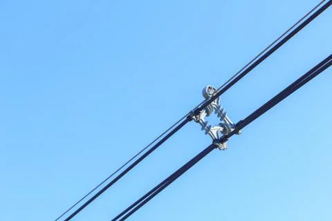 Device for mounting a high-voltage power lines. Stock Photos