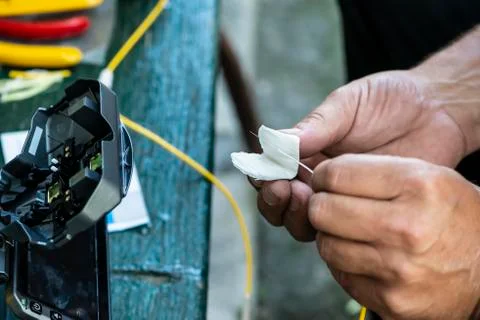 Device for mounting optical cable. Optical internet Technology concept. Stock Photos