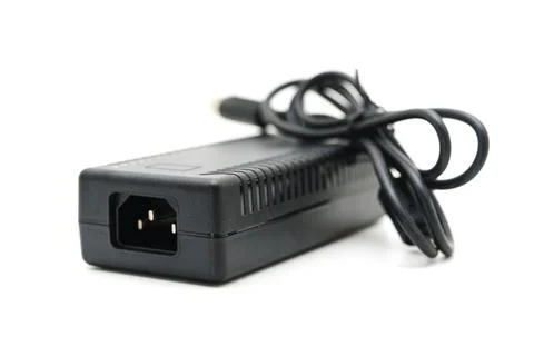 Device power supply with cable on white background Stock Photos