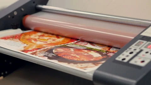 The device roll laminator during its work Stock Footage 116706117