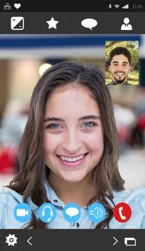 Device screen showing call interface featuring smiling woman with man thumbnail 스톡 사진