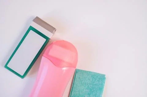 A device used for applying wax to the skin for depilation Stock Photos