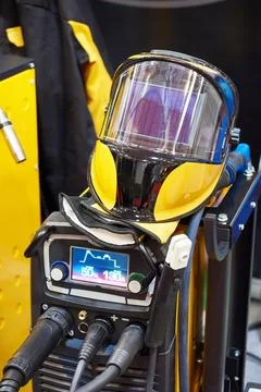 Device for welding, gloves and protective mask Stock Photos