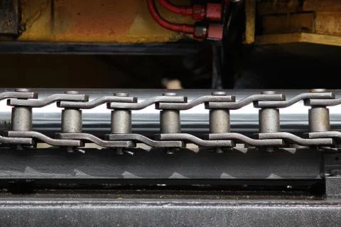 The device of a yellow loader on the railway. Stock Photos