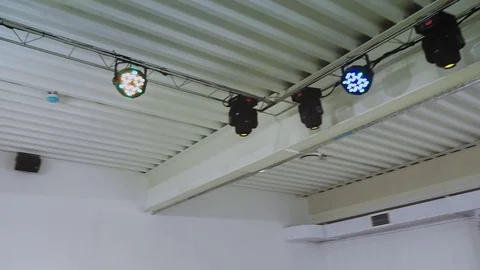Devices for disco light fixed on the farm ceiling and the overall plan of the Stock Footage 97721527