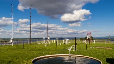 Devices for measuring wind speed, rainfall at weather station at summer day Stock Footage 76192019