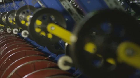 Devices Reel Threads on Rotating Bobbins in Plant Flow Focus Stock Footage 84551895
